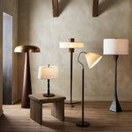 Featuring Griffin Russet Mango Floor Lamp by Four Hands at Amethyst Home. A stylish nod to midcentury mushroom lamps, this beautifully scaled wood lamp features a gleaming metal shade finished in aged brass. It's topped with a small wood finial to complete the look.Overall Dimensions: 26.00"w x 26.00"d x 63.75"hWeight : 40.56 lbsMaterials : Solid Mango, Iron. Amethyst Home provides interior design, new construction, custom furniture, and area rugs in the Park City metro area