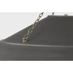 With its exposed metalwork, chain detailing, and unique finish combination, Arcane has an elevated, industrial vibe. The graphite shade feels chic and gives off a warm glow. The Patina Brass hardware, chain, and canopy add a hint of shine that plays wonderfully off the graphite. Amethyst Home provides interior design, new home construction design consulting, vintage area rugs, and lighting in the Boston metro area.