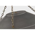 With its exposed metalwork, chain detailing, and unique finish combination, Arcane has an elevated, industrial vibe. The graphite shade feels chic and gives off a warm glow. The Patina Brass hardware, chain, and canopy add a hint of shine that plays wonderfully off the graphite. Amethyst Home provides interior design, new home construction design consulting, vintage area rugs, and lighting in the Newport Beach metro area.