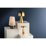 The contrast between the oblong domed shade and the conical base of Hopkinton creates a striking geometric design. Whether this petite lamp is finished in Aged Brass or Distressed Bronze, the on-trend mushroom silhouette adds a dose of personality. Its integrated rechargeable LED light source ensures lasting functionality. Amethyst Home provides interior design, new home construction design consulting, vintage area rugs, and lighting in the Washington metro area.