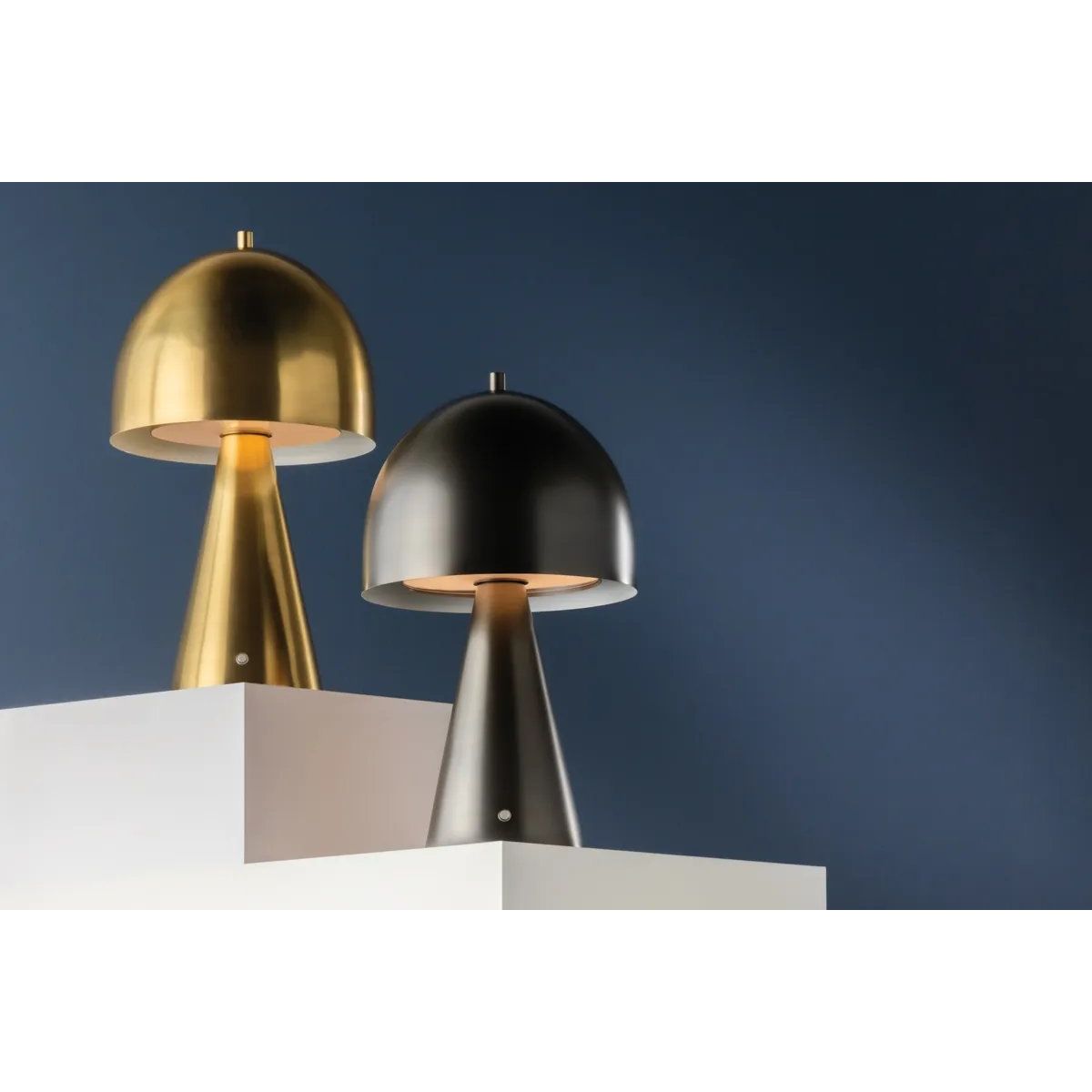 The contrast between the oblong domed shade and the conical base of Hopkinton creates a striking geometric design. Whether this petite lamp is finished in Aged Brass or Distressed Bronze, the on-trend mushroom silhouette adds a dose of personality. Its integrated rechargeable LED light source ensures lasting functionality. Amethyst Home provides interior design, new home construction design consulting, vintage area rugs, and lighting in the Laguna Beach metro area.