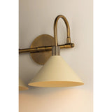 A modern interpretation of Art Deco shapes, the Jovani bath bar features elongated arms and sharply tapered Soft Sand shades. The clean design highlights the connections between elements through pronounced fittings and subtle fluting details. Finished in classic Patina Brass, Jovani is available with 1, 2, or 3 lights. Amethyst Home provides interior design, new home construction design consulting, vintage area rugs, and lighting in the Calabasas metro area.