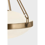 The Kade pendant updates a nostalgic shape with sleek, industrial metalwork and two large opal matte glass shades. Inspired by vintage elements, it features a striking suspension technique with three oversized loops connecting to the central housing above the fixture. The Patina Brass finish adds old-world finesse to the frame. Amethyst Home provides interior design, new home construction design consulting, vintage area rugs, and lighting in the Calabasas metro area.