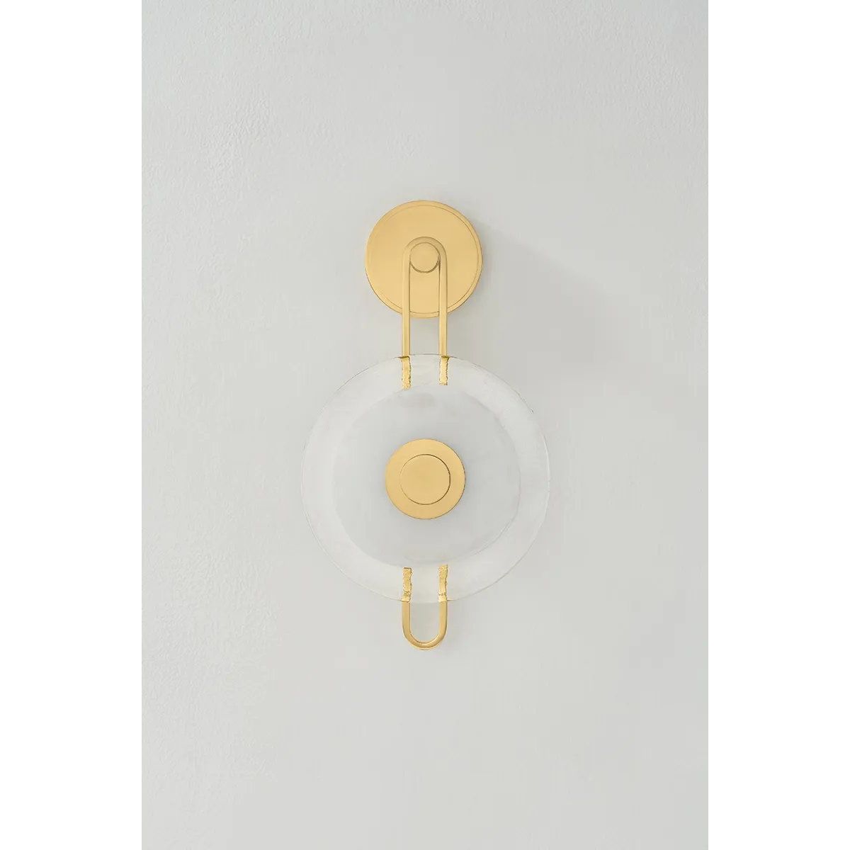 The earring-like design of Keuka Park exudes ornamental, graphic appeal. A thick disc of Blonchino Piastre glass is illuminated at the point where it attaches to the racetrack frame of this striking wall fixture. Whether finished in Aged Brass or Old Bronze, Keuka Park brings modernist artistry to any wall. Amethyst Home provides interior design, new home construction design consulting, vintage area rugs, and lighting in the Monterey metro area.
