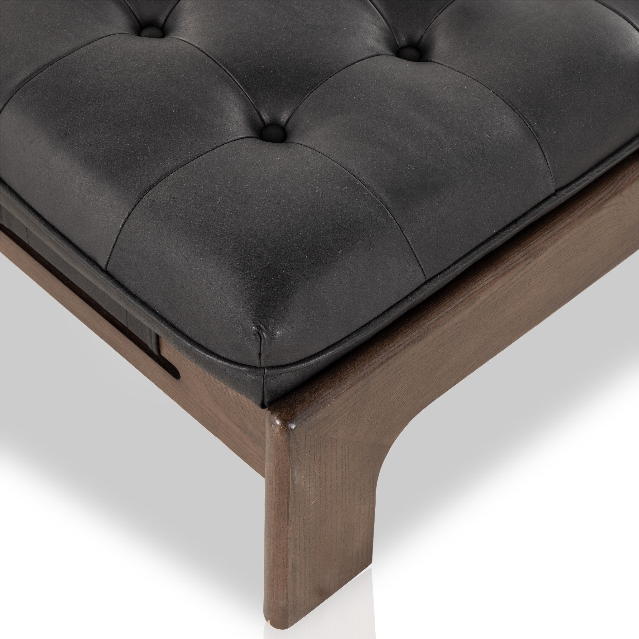 Featuring Halston Heirloom Black Cocktail Ottoman by Four Hands at Amethyst Home. A Seventies-era style inspired by a flea market find. Top-grain leather features dramatic tufting with sling detailing and wide ash framing below. Sourced from one of the oldest family-owned tanneries in Italy's Bassano del Grappa, heirloom leather is salvaged and processed from upcycled hides featuri. Amethyst Home provides interior design, new construction, custom furniture, and area rugs in the Portland metro area