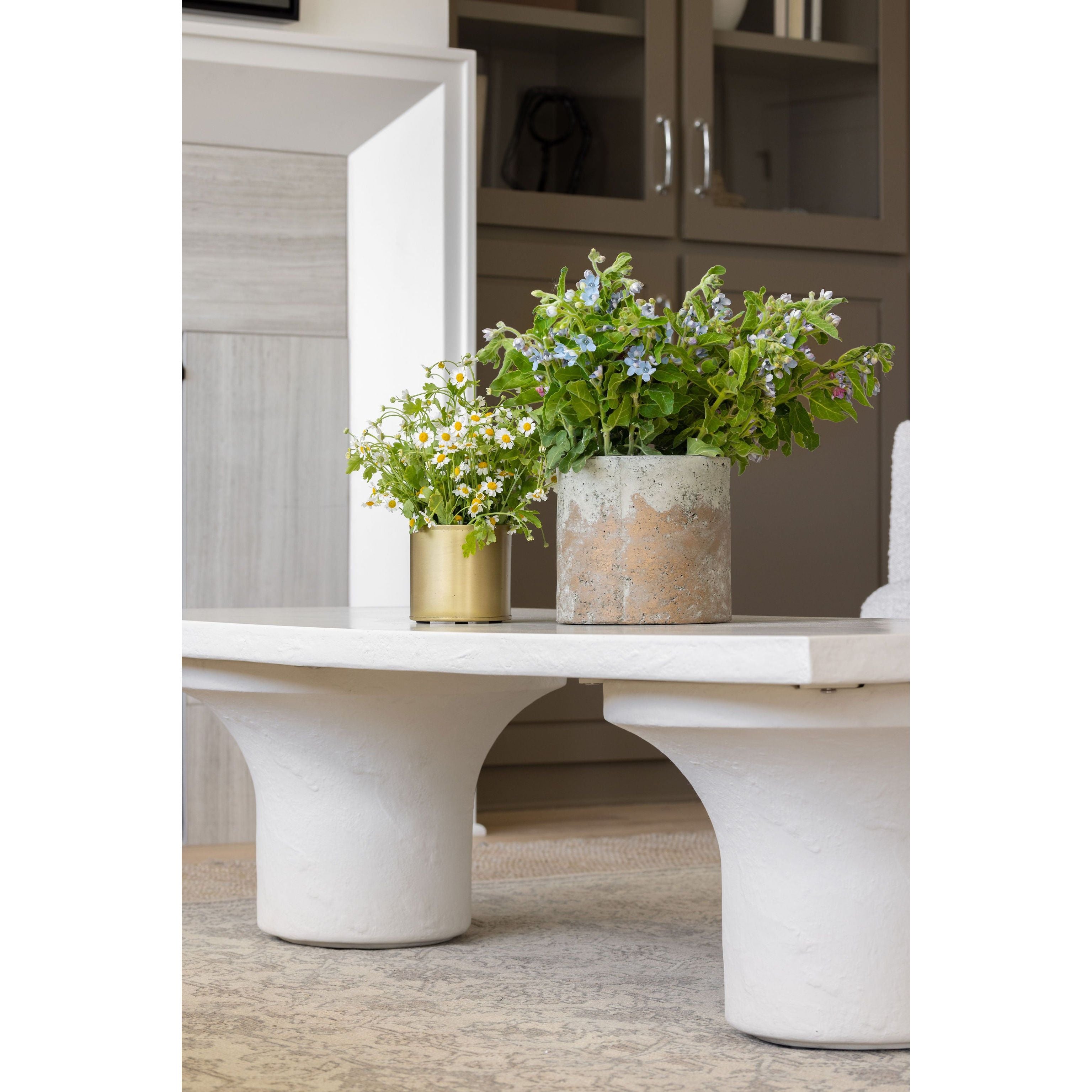 Featuring Parra Coffee Table - Plaster Molded Concrete by Four Hands at Amethyst Home. Make a monolithic statement with this Parra Coffee Table - Plaster Molded Concrete. Made from plaster-molded concrete, the pedestal-style legs support a rectangular tabletop of smooth, white-finished concrete, for a clean, adobe-inspired look.
Overall Dimensions: 59.75"W. Amethyst Home provides interior design, new home construction design consulting, vintage area rugs, and lighting in the Scottsdale metro area.