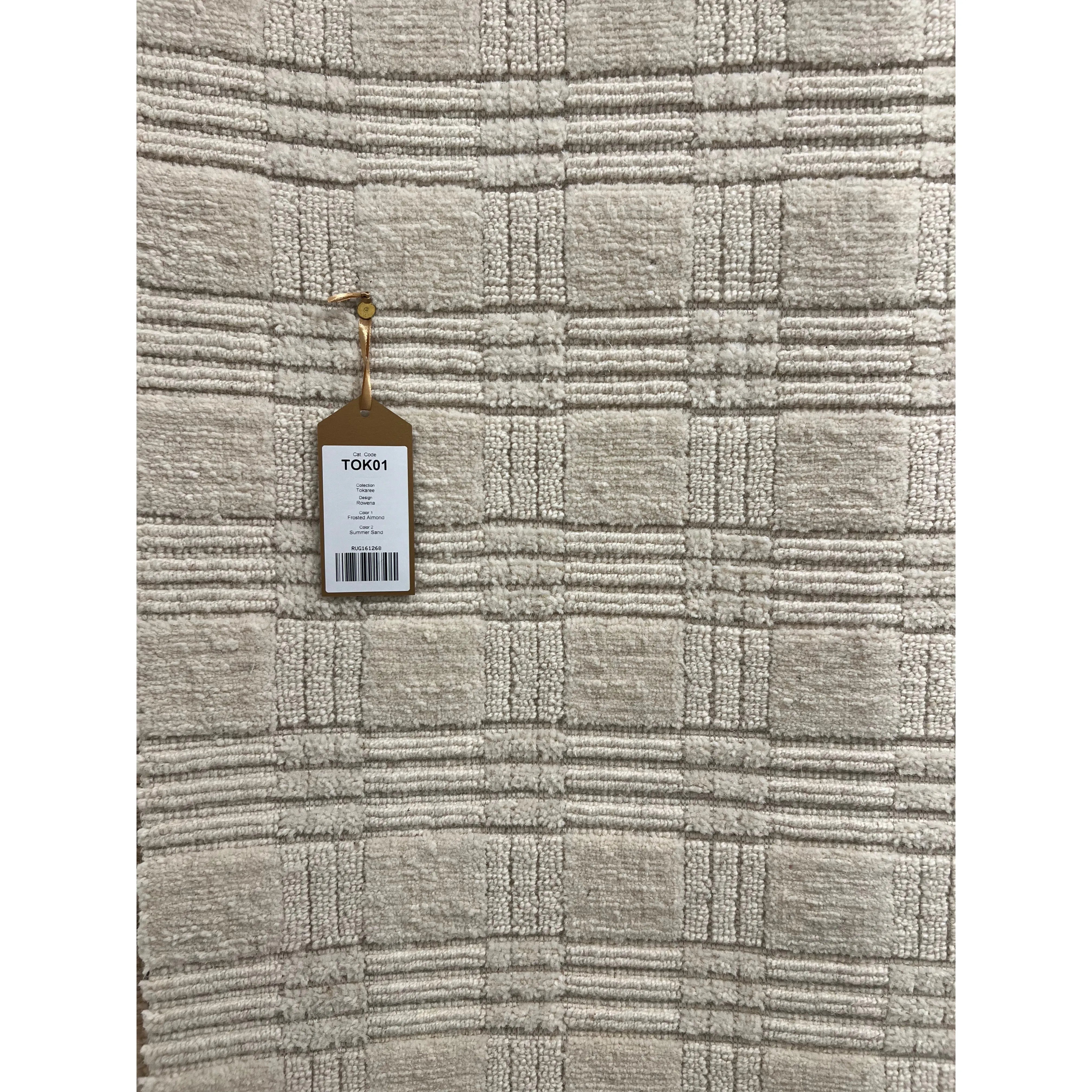 Featuring Tokaree Rowena Rug by Jaipur Living at Amethyst Home. Reminiscent of a basketweave, The Tokaree Rowena demonstrates sophistication and simplicity in a tonal taupe checker pattern.  Handwoven of 100% wool, varied pile height creates a unique texture and luxurious depth while maintaining durability and quality that are synonymous with our artisans.  Amethyst Home provides interior design, new home construction design consulting, vintage area rugs, and lighting in the Scottsdale metro area.