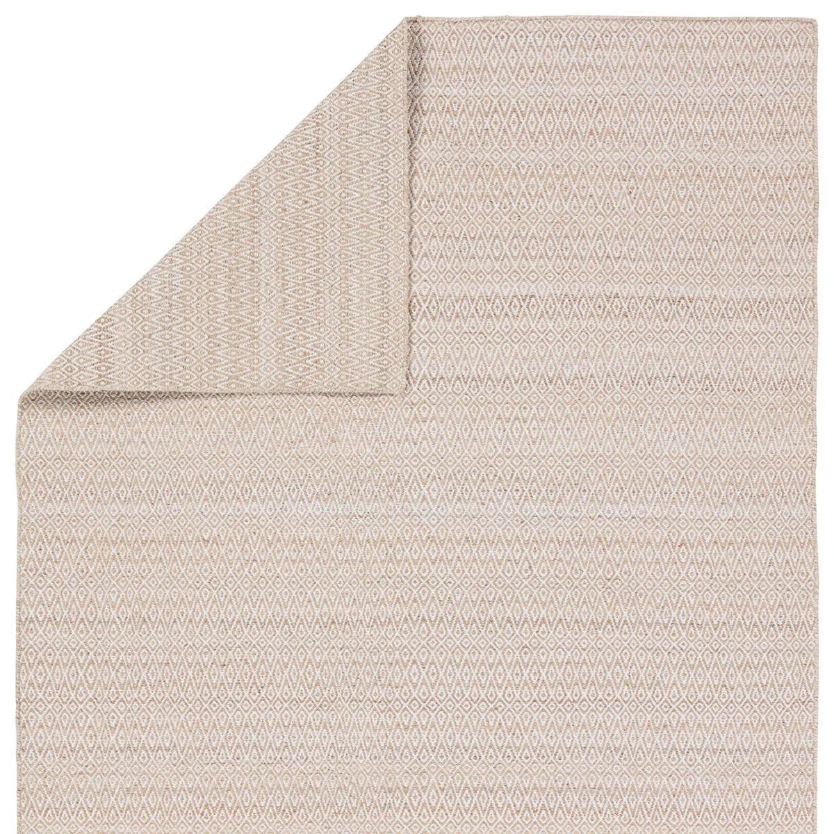 Featuring Almas Imogen Rug by Jaipur Living at Amethyst Home. Handwoven of weather-resistant PET, the Almas Imogen delights with contemporary colorways and designs. The Imogen design showcases a diamond trellis pattern in a colorway of tan and cream. The variegated neutral hues provide a subtle distressed look that wears well over time. Crafted of recycle. Amethyst Home provides interior design, new home construction design consulting, vintage area rugs, and lighting in the Los Angeles metro area.