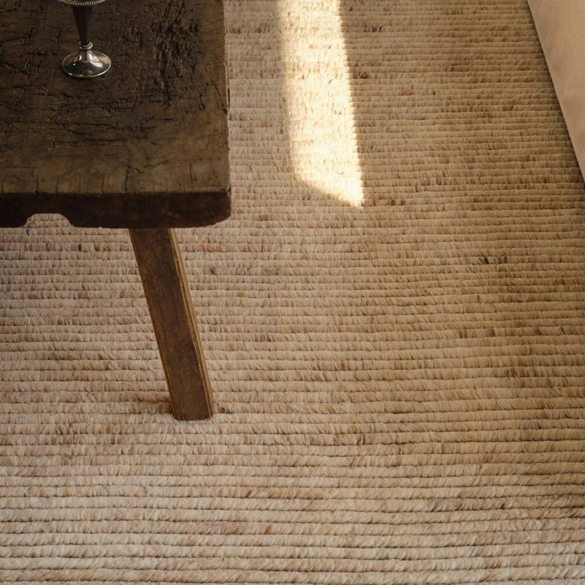 Featuring Alpine Oatmeal Hand-Knotted Rug by Jaipur Living at Amethyst Home. Drawing inspiration from Moroccan textiles, Alpine showcases the beauty in simplicity. Durable wool is hand-knotted onto a cotton foundation to create this high-piled accent piece. Its warm, solid tan design is finished with braided fringe trims for a touch of boho charm. Alpine insta. Amethyst Home provides interior design, new home construction design consulting, vintage area rugs, and lighting in the Austin metro area.