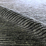 Featuring Alpine Hand-Knotted Rug by Jaipur Living at Amethyst Home. Drawing inspiration from Moroccan textiles, Alpine showcases the beauty in simplicity. Durable wool is hand-knotted onto a cotton foundation to create this high-piled accent piece. Its solid gray design instantly adds warmth and comfort to any indoor, medium-traffic setting.Hand Knotted100% . Amethyst Home provides interior design, new home construction design consulting, vintage area rugs, and lighting in the Houston metro area.