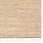 Featuring Alpine Oatmeal Hand-Knotted Rug by Jaipur Living at Amethyst Home. Drawing inspiration from Moroccan textiles, Alpine showcases the beauty in simplicity. Durable wool is hand-knotted onto a cotton foundation to create this high-piled accent piece. Its warm, solid tan design is finished with braided fringe trims for a touch of boho charm. Alpin. Amethyst Home provides interior design, new home construction design consulting, vintage area rugs, and lighting in the Newport Beach metro area.