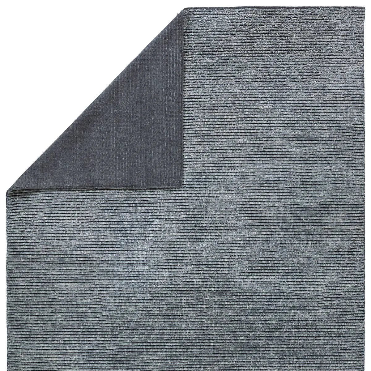 Featuring Alpine Hand-Knotted Rug by Jaipur Living at Amethyst Home. Drawing inspiration from Moroccan textiles, Alpine showcases the beauty in simplicity. Durable wool is hand-knotted onto a cotton foundation to create this high-piled accent piece. Its solid gray design instantly adds warmth and comfort to any indoor, medium-traffic setting.Hand Knotted100%. Amethyst Home provides interior design, new home construction design consulting, vintage area rugs, and lighting in the Portland metro area.