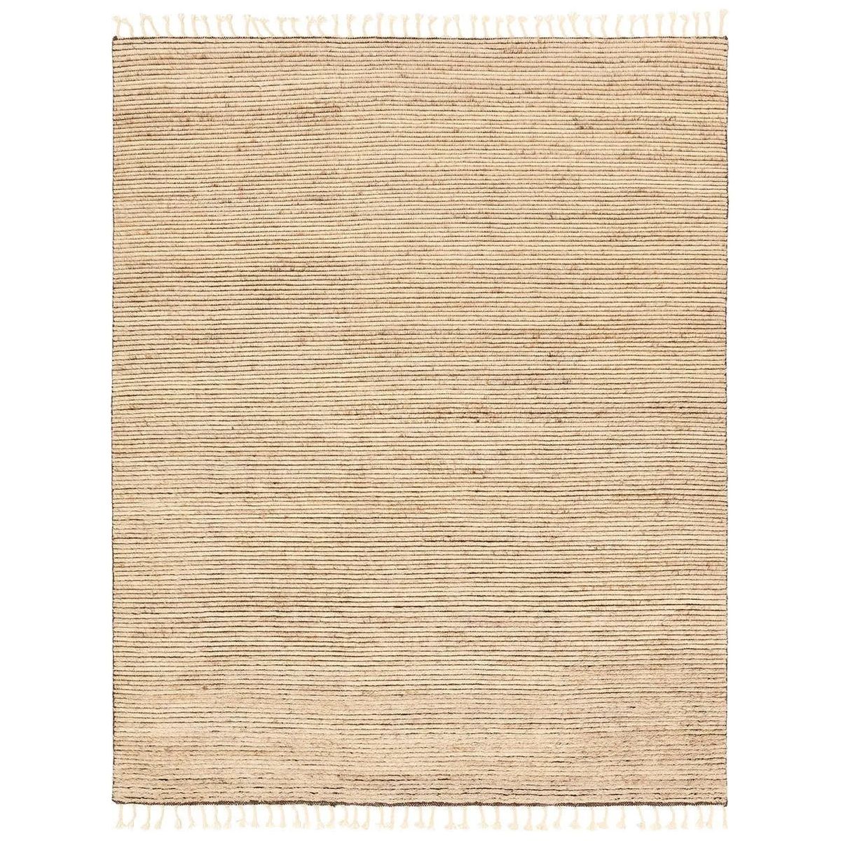 Featuring Alpine Oatmeal Hand-Knotted Rug by Jaipur Living at Amethyst Home. Drawing inspiration from Moroccan textiles, Alpine showcases the beauty in simplicity. Durable wool is hand-knotted onto a cotton foundation to create this high-piled accent piece. Its warm, solid tan design is finished with braided fringe trims for a touch of boho charm. Alpine in. Amethyst Home provides interior design, new home construction design consulting, vintage area rugs, and lighting in the San Diego metro area.