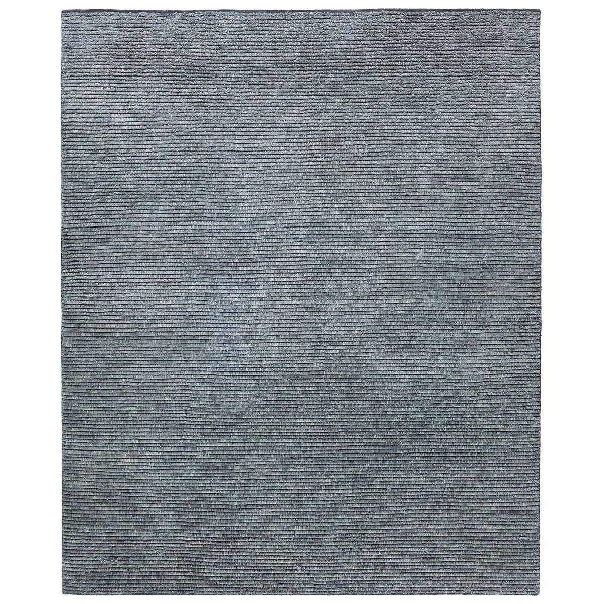 Featuring Alpine Hand-Knotted Rug by Jaipur Living at Amethyst Home. Drawing inspiration from Moroccan textiles, Alpine showcases the beauty in simplicity. Durable wool is hand-knotted onto a cotton foundation to create this high-piled accent piece. Its solid gray design instantly adds warmth and comfort to any indoor, medium-traffic setting.Hand Knotted100. Amethyst Home provides interior design, new home construction design consulting, vintage area rugs, and lighting in the San Diego metro area.