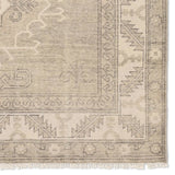 Featuring Apollo Famille Hand-Knotted Rug by Jaipur Living at Amethyst Home. An updated take on traditional design, the Apollo Famille is hand knotted of 100% wool by artisans in India for a luxurious, high-quality design.  The Famillie design features two classic medallions adorned with Elibelinde motifs with a distinct border honoring the Garden of Eden.H. Amethyst Home provides interior design, new home construction design consulting, vintage area rugs, and lighting in the Park City metro area.