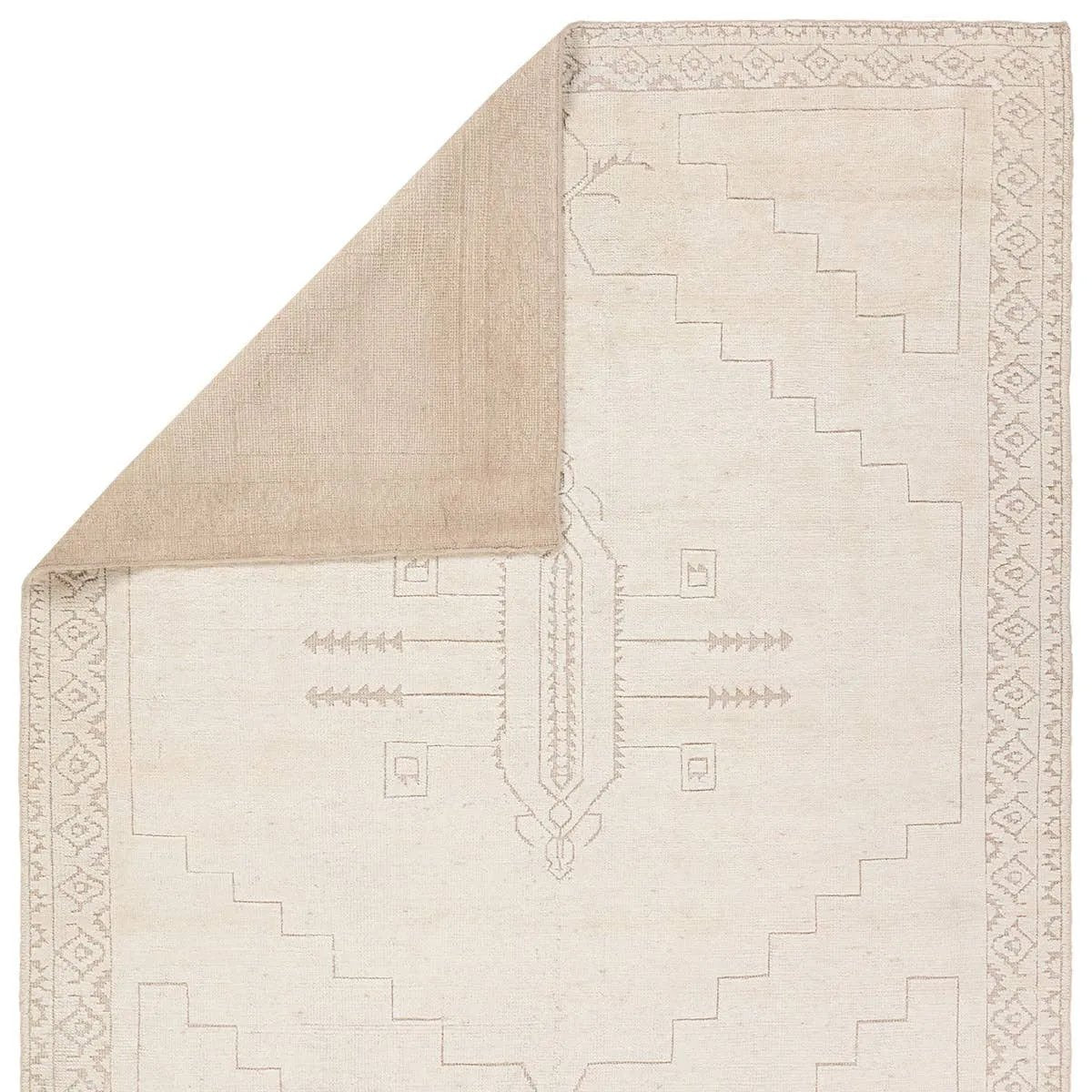 Featuring Ashend Imbar Hand-Knotted Rug by Jaipur Living at Amethyst Home. Hand carded wool, soft Tencel, and a neutral color palette define the handknotted Ashend Imbar. The Imbar rug showcases a Moroccan-inspired center medallion in a neutral, cream, taupe, and beige colorway. Geometric detailing via high and low pile establishes a thin border and provides a. Amethyst Home provides interior design, new home construction design consulting, vintage area rugs, and lighting in the Austin metro area.