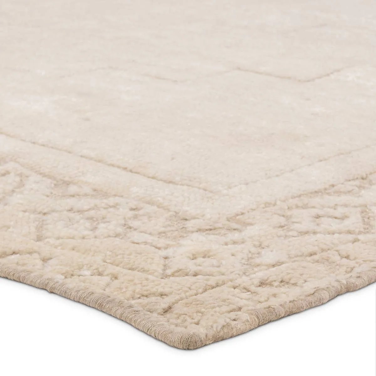 Featuring Ashend Imbar Hand-Knotted Rug by Jaipur Living at Amethyst Home. Hand carded wool, soft Tencel, and a neutral color palette define the handknotted Ashend Imbar. The Imbar rug showcases a Moroccan-inspired center medallion in a neutral, cream, taupe, and beige colorway. Geometric detailing via high and low pile establishes a thin border and provides a . Amethyst Home provides interior design, new home construction design consulting, vintage area rugs, and lighting in the Miami metro area.