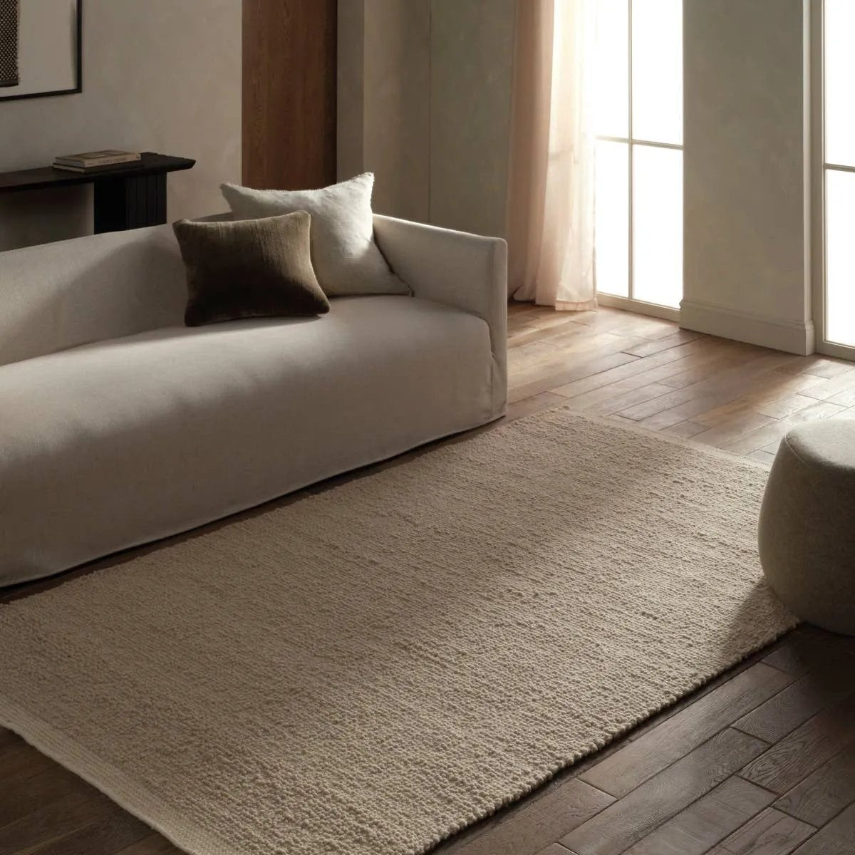 Featuring Brodie Rug by Jaipur Living at Amethyst Home. Cozy and stylish in the same moment, the hand-loomed Vestra Brodie boasts the soft and inviting texture of the shearling look with the addition of subtle, sophisticated details. With a neutral brown colorway, the Tadeo rug complements a room without detracting from its current design scheme.Handwoven65%. Amethyst Home provides interior design, new home construction design consulting, vintage area rugs, and lighting in the Monterey metro area.