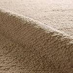 Featuring Brodie Rug by Jaipur Living at Amethyst Home. Cozy and stylish in the same moment, the hand-loomed Vestra Brodie boasts the soft and inviting texture of the shearling look with the addition of subtle, sophisticated details. With a neutral brown colorway, the Tadeo rug complements a room without detracting from its current design scheme.Handwov. Amethyst Home provides interior design, new home construction design consulting, vintage area rugs, and lighting in the Newport Beach metro area.