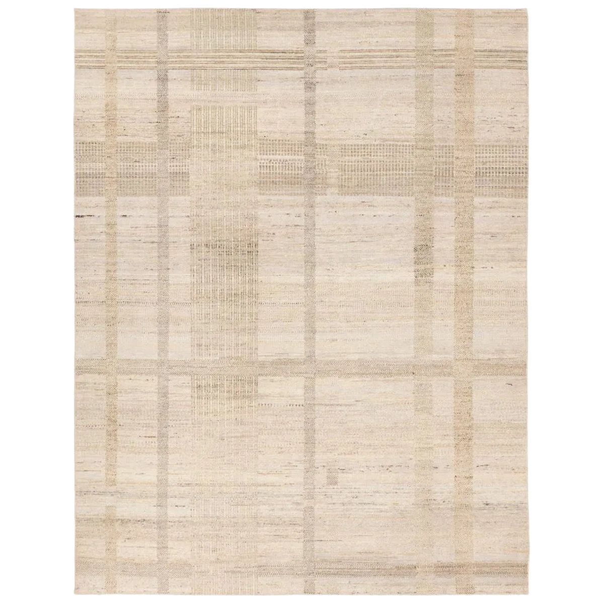 Featuring Centenary Digon Hand-Knotted Rug by Jaipur Living at Amethyst Home. Giving homage to the long lifespan of this handmade masterpiece, the Centenary Digon provides heirloom quality for generations to come.  With a spectrum of taupe modern plaid stripes, the Digon rug is 100% wool and made for optimum durability.Hand Knotted100% WoolCEN02 Centenary . Amethyst Home provides interior design, new home construction design consulting, vintage area rugs, and lighting in the Des Moines metro area.