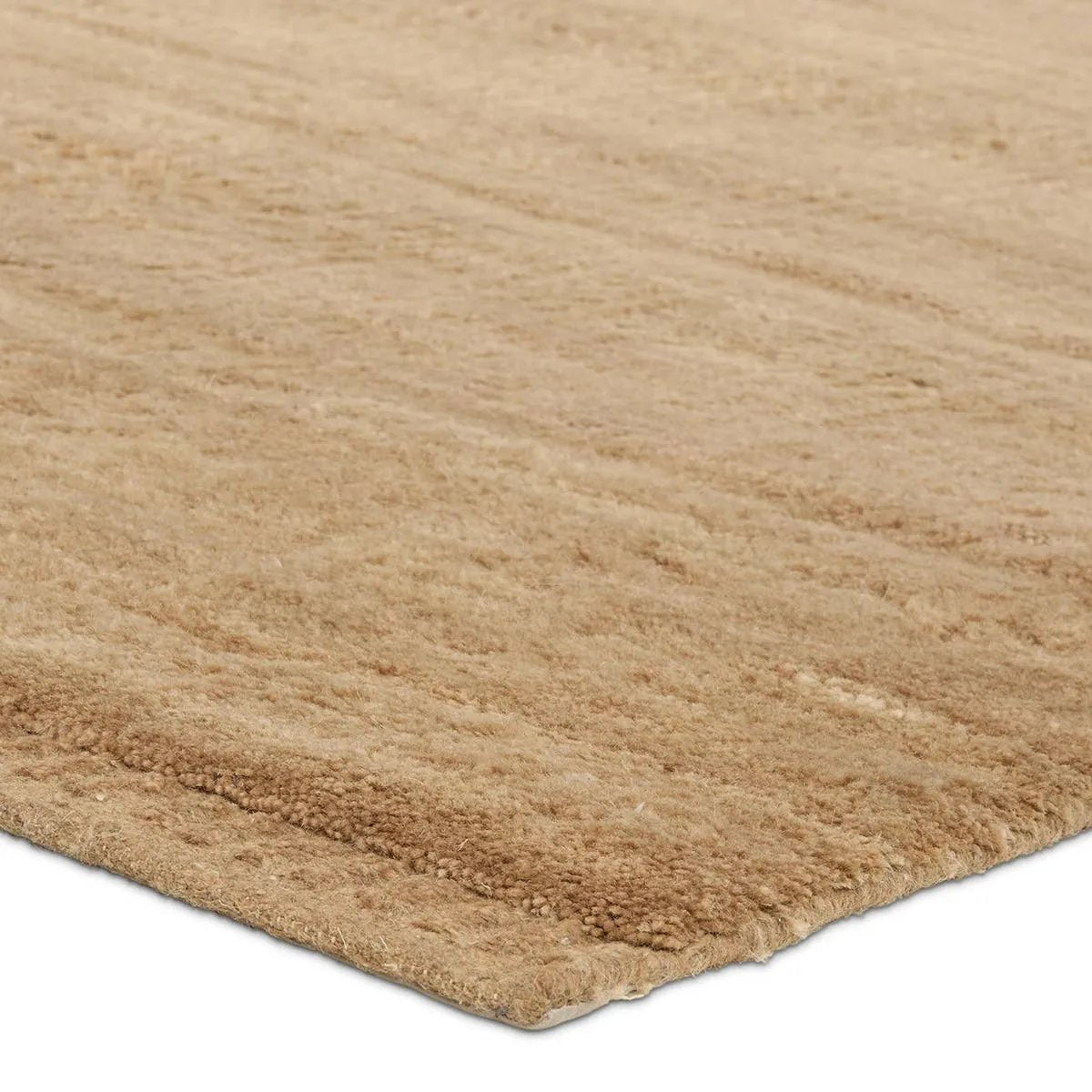 Featuring Colson Hand-Knotted Rug by Jaipur Living at Amethyst Home. The Bekarys Colson features shaggy texture with a remarkably soft pile that invites relaxation and warmth. Its solid neutral tones provide a versatile backdrop that enhances any decor. This plush, hand-knotted gem offers both tactile pleasure and visual appeal.Hand Knotted100% WoolBKR03 Be. Amethyst Home provides interior design, new home construction design consulting, vintage area rugs, and lighting in the Calabasas metro area.