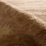 Featuring Colson Hand-Knotted Rug by Jaipur Living at Amethyst Home. The Bekarys Colson features shaggy texture with a remarkably soft pile that invites relaxation and warmth. Its solid neutral tones provide a versatile backdrop that enhances any decor. This plush, hand-knotted gem offers both tactile pleasure and visual appeal.Hand Knotted100% WoolBKR03 . Amethyst Home provides interior design, new home construction design consulting, vintage area rugs, and lighting in the Los Angeles metro area.