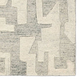 Featuring Eminence Rug by Jaipur Living at Amethyst Home. The handtufted Mallino Eminence designed by Nikki Chu infuses homes with contemporary appeal and stylishly contrasting motifs. Crafted from 100% undyed wool, the Eminence rug features a high-low texture with a soft hand and hand-embossed details. The tonal gray and ivory white geometric pattern embo. Amethyst Home provides interior design, new home construction design consulting, vintage area rugs, and lighting in the Washington metro area.