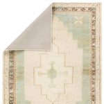 Featuring Enigma Rug by Jaipur Living at Amethyst Home. The Enigma design blends timeless tradition with a vintage-inspired aesthetic. Featuring a striking central medallion, this rug boasts an elegant ivory and white backdrop, accented by light blue detailing. Its classic pattern and gently distressed finish give it an heirloom feel from the very first step.Ha. Amethyst Home provides interior design, new home construction design consulting, vintage area rugs, and lighting in the Omaha metro area.
