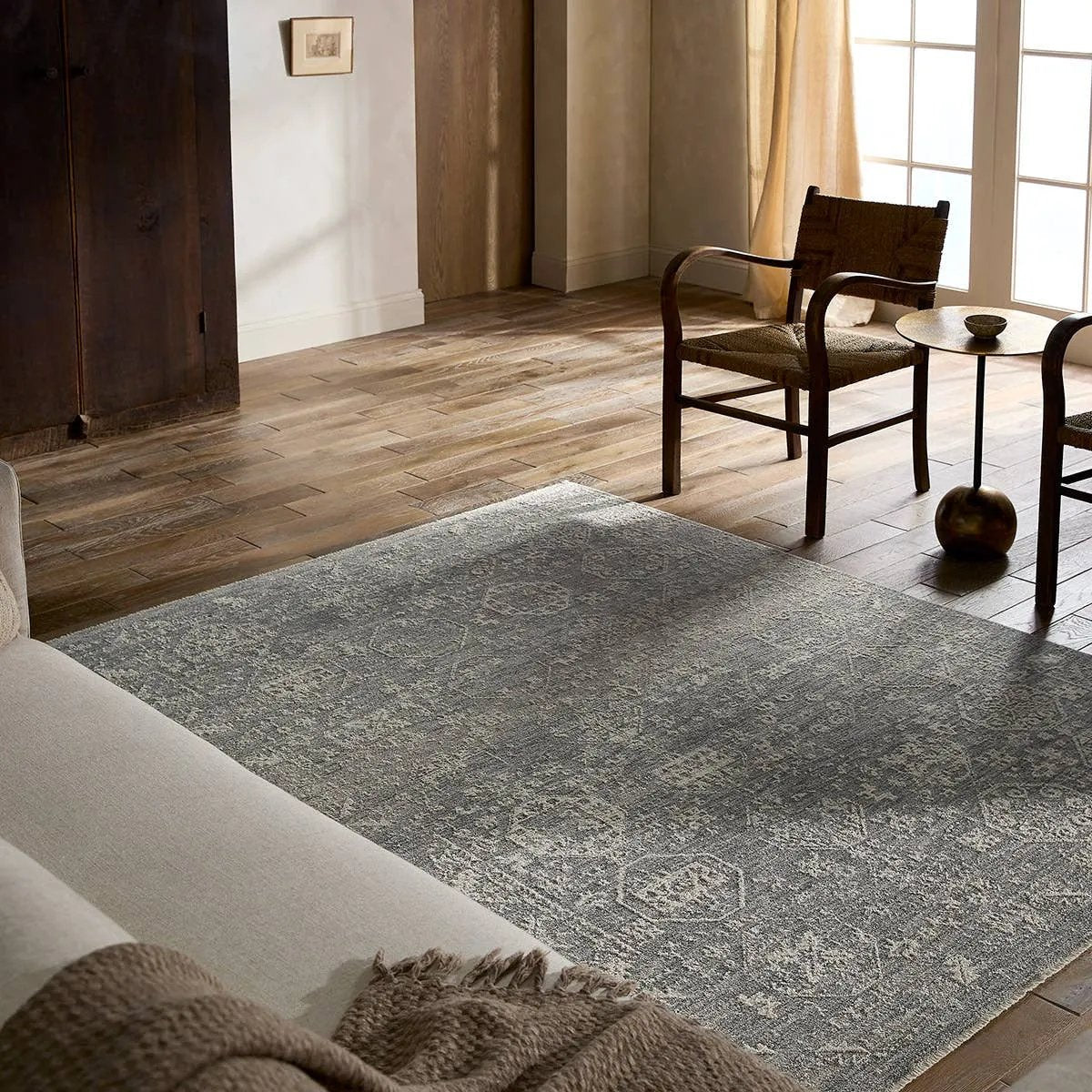 Featuring Faiza Rug by Jaipur Living at Amethyst Home. Elegant and classic, the Faiza design presents a largely sought-after Tabriz-inspired pattern in a durable, powerloomed construction. The beautiful blue and gray oriental pattern effortlessly elevates any medium-traffic indoor setting. Space-dyed polyester introduces subtle, intriguing color variatio. Amethyst Home provides interior design, new home construction design consulting, vintage area rugs, and lighting in the Laguna Beach metro area.