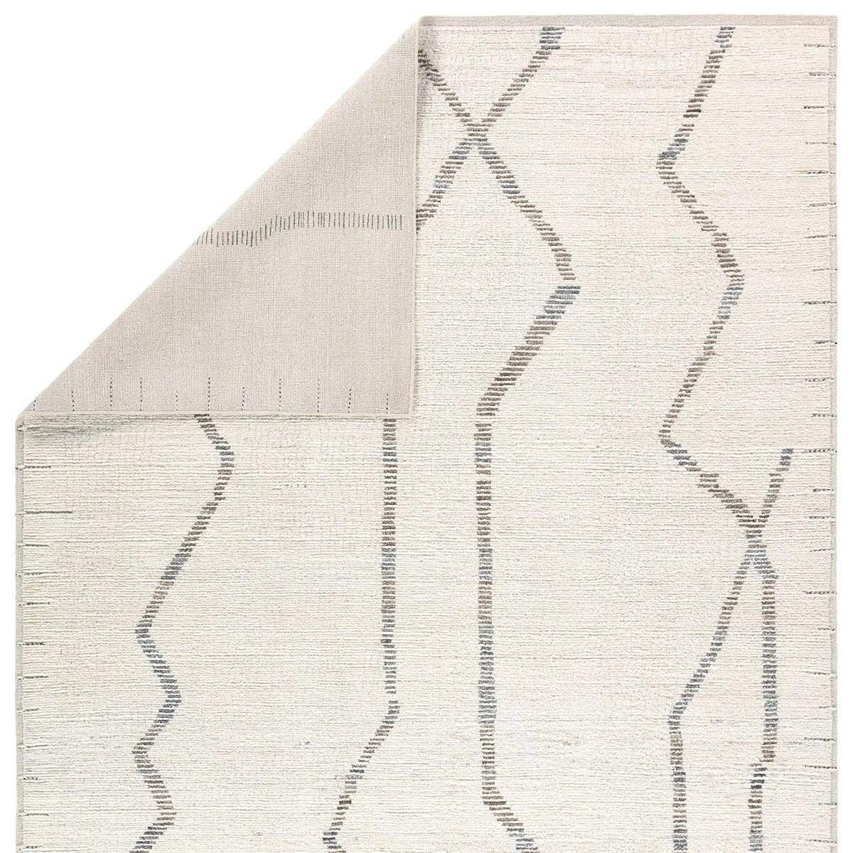 Featuring Gisella Hand-Knotted Rug by Jaipur Living at Amethyst Home. With its understated adventurous spirit, the Kazben Gisella whispers luxury. A tribute to the collective decades of quality rug-making, it’s an investment for today and tomorrow. The Gisella design speaks to the artistry of finely made rugs, with a gentle, low-ribbed pile that feels sult. Amethyst Home provides interior design, new home construction design consulting, vintage area rugs, and lighting in the Washington metro area.