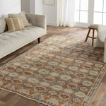 Featuring Hazan Titale Hand-Knotted Rug by Jaipur Living at Amethyst Home. The Turkish-Killum-inspired Hazan Titale is intricately handknotted by artisans in India. Crafted with 15 knots per square inch, these durable area rugs thrive in both high and low traffic areas of the home. The Titale design showcases traditional-style miniature medallions in orange. Amethyst Home provides interior design, new home construction design consulting, vintage area rugs, and lighting in the Calabasas metro area.