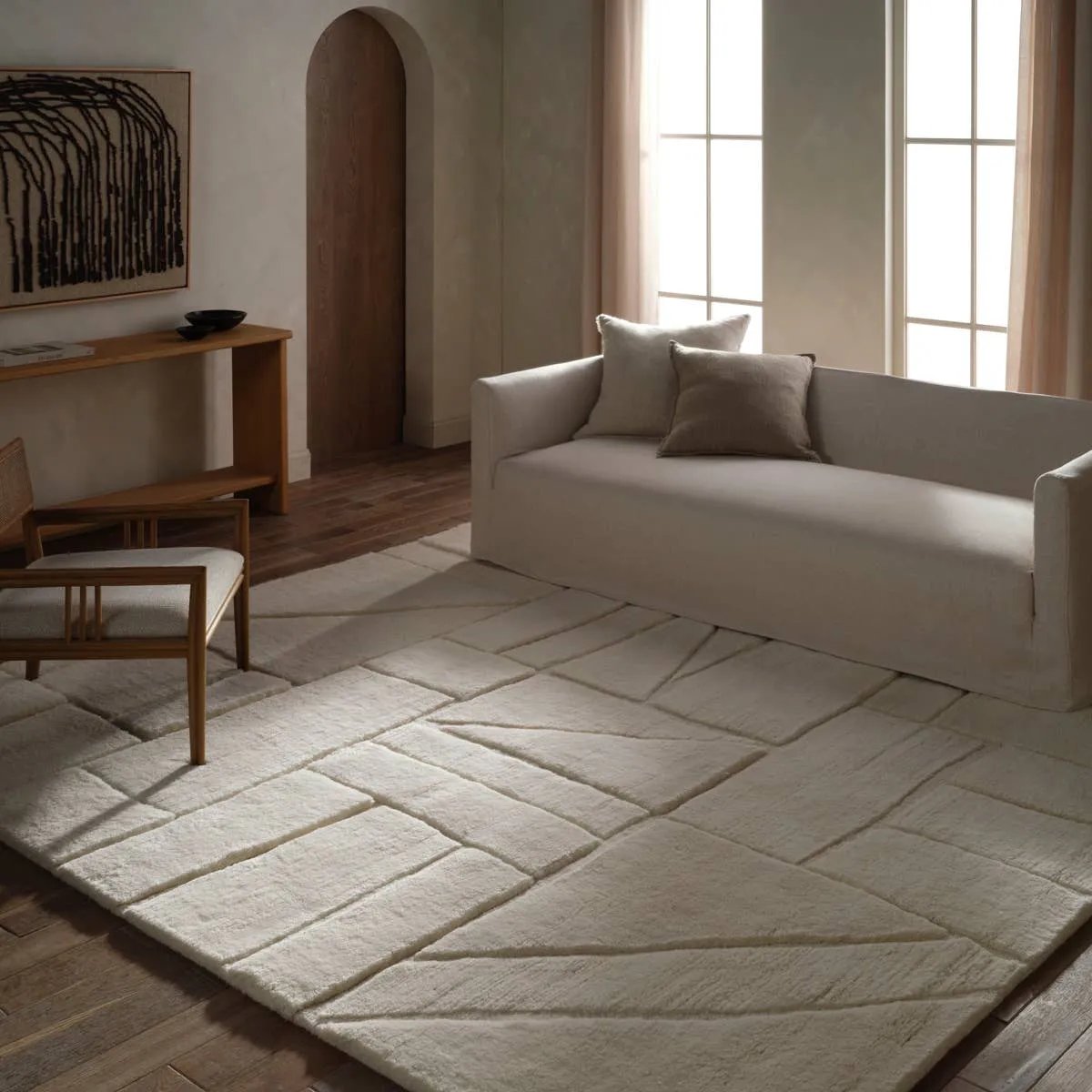 Featuring Jamun Hand-Knotted Rug by Jaipur Living at Amethyst Home. Embrace clean, simple elegance with the Ameln Jamun. As artisans knot each strand by hand, they weave in modern, centric lines that balance Moroccan heritage with contemporary edge. Made from lush New Zealand wool, the Jamun rug offers delicious dimension and a cloud-like texture, offering comf. Amethyst Home provides interior design, new home construction design consulting, vintage area rugs, and lighting in the Tampa metro area.