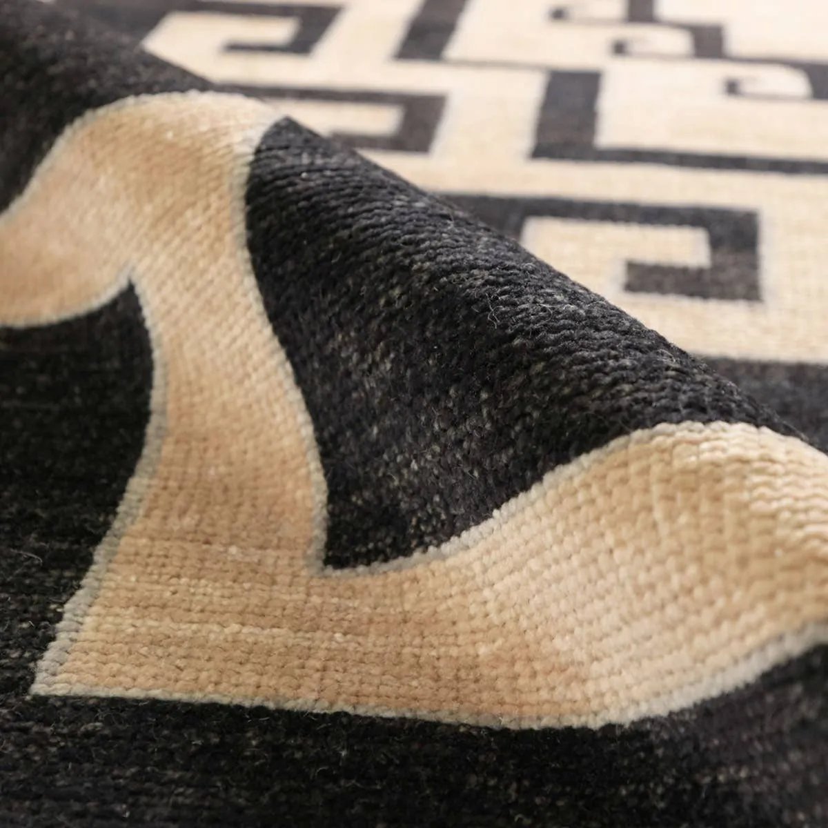 Featuring Kyrenia Hand-Knotted Rug by Jaipur Living at Amethyst Home. Anchor your space with a modern representation of vintage Kars designs through bold geometric design. Kyrenia?s striking, maze-like pattern guides eyes through any area. Hand knotted for durability with kid- and pet-friendly materials, it?s ideal for busy rooms.Hand Knotted100% WoolCY. Amethyst Home provides interior design, new home construction design consulting, vintage area rugs, and lighting in the Newport Beach metro area.