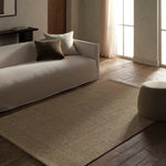 Featuring Bahan Laney Rug by Jaipur Living at Amethyst Home. The Bahan Laney grounds your space with airy shades and organic texture. Made from 100% natural sisal fibers, the Laney rug features a boucle weave for a subtle ribbed effect and a rubber latex back to secure it in place. With its organic sheen and easy-care qualities, it serves as a beautiful tac. Amethyst Home provides interior design, new home construction design consulting, vintage area rugs, and lighting in the San Diego metro area.