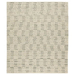 Featuring Leona  Elver Rug by Jaipur Living at Amethyst Home. The texture-rich Leona Elver offers an assortment of updated kilim looks, re-invented with the on-trend shearling style and neutral, modern palettes. The handwoven Elver rug features a globally inspired, gray dot and ticking line pattern on a neutral tan base. This 100% wool accent piece delight. Amethyst Home provides interior design, new home construction design consulting, vintage area rugs, and lighting in the Des Moines metro area.