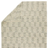 Featuring Leona  Elver Rug by Jaipur Living at Amethyst Home. The texture-rich Leona Elver offers an assortment of updated kilim looks, re-invented with the on-trend shearling style and neutral, modern palettes. The handwoven Elver rug features a globally inspired, gray dot and ticking line pattern on a neutral tan base. This 100% wool accent piece delights i. Amethyst Home provides interior design, new home construction design consulting, vintage area rugs, and lighting in the Houston metro area.