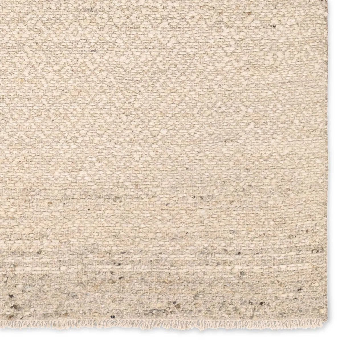 Featuring Leona Folade Rug by Jaipur Living at Amethyst Home. The texture-rich Leona Folade offers an assortment of updated kilim looks, re-invented with the on-trend shearling style and neutral, modern palettes. The handwoven Folade rug features a distressed tan base with hints of trellis beige detailing. This 100% wool accent piece delights in high and low . Amethyst Home provides interior design, new home construction design consulting, vintage area rugs, and lighting in the Houston metro area.