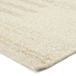 Featuring Leona  Istar Rug by Jaipur Living at Amethyst Home. The texture-rich Leona Istar offers an assortment of updated kilim looks, re-invented with the on-trend shearling style and neutral, modern palettes. The handwoven Istar rug features a globally inspired, light tan, stripe pattern on a neutral cream base. This 100% wool accent piece delights in high . Amethyst Home provides interior design, new home construction design consulting, vintage area rugs, and lighting in the Boston metro area.