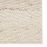 Featuring Leona  Klarna Rug by Jaipur Living at Amethyst Home. The texture-rich Leona Klarna offers an assortment of updated kilim looks, re-invented with the on-trend shearling style and neutral, modern palettes. The handwoven Klarna rug features a globally inspired, light brown, stripe pattern on a neutral cream base. This 100% wool accent piece delights . Amethyst Home provides interior design, new home construction design consulting, vintage area rugs, and lighting in the San Diego metro area.