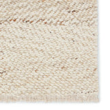 Featuring Leona  Klarna Rug by Jaipur Living at Amethyst Home. The texture-rich Leona Klarna offers an assortment of updated kilim looks, re-invented with the on-trend shearling style and neutral, modern palettes. The handwoven Klarna rug features a globally inspired, light brown, stripe pattern on a neutral cream base. This 100% wool accent piece delights . Amethyst Home provides interior design, new home construction design consulting, vintage area rugs, and lighting in the San Diego metro area.
