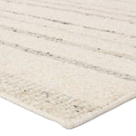 Featuring Leona Rya Rug by Jaipur Living at Amethyst Home. The texture-rich Leona Rya offers an assortment of updated kilim looks, re-invented with the on-trend shearling style and neutral, modern palettes. The handwoven Rya rug features a cream base with taupe stripes. This 100% wool accent piece delights in high and low traffic spaces such as bedrooms, livin. Amethyst Home provides interior design, new home construction design consulting, vintage area rugs, and lighting in the Dallas metro area.