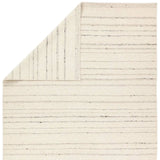 Featuring Leona Rya Rug by Jaipur Living at Amethyst Home. The texture-rich Leona Rya offers an assortment of updated kilim looks, re-invented with the on-trend shearling style and neutral, modern palettes. The handwoven Rya rug features a cream base with taupe stripes. This 100% wool accent piece delights in high and low traffic spaces such as bedrooms, living. Amethyst Home provides interior design, new home construction design consulting, vintage area rugs, and lighting in the Tampa metro area.