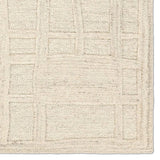Featuring Lustrous Rug by Jaipur Living at Amethyst Home. The Lustrous design features flowing waves of 100% premium undyed wool in soft cream tones. Its high-low texture creates movement, adding an earthy, elemental ease to any modern space. Crafted with care to mimic a soumak weave, this rug offers timeless elegance and a soft, tactile feel.Hand Tufted100% W. Amethyst Home provides interior design, new home construction design consulting, vintage area rugs, and lighting in the Boston metro area.