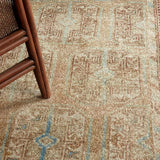 Featuring Magnus Rug by Jaipur Living at Amethyst Home. The Magnus design features a traditional pattern of small medallions set against a warm tan and beige backdrop, highlighted by subtle blue accents. Its vintage, distressed finish adds character and charm, making it feel like a treasured heirloom from the very first step.Hand Tufted100% PET YarnCSN02 . Amethyst Home provides interior design, new home construction design consulting, vintage area rugs, and lighting in the Los Angeles metro area.
