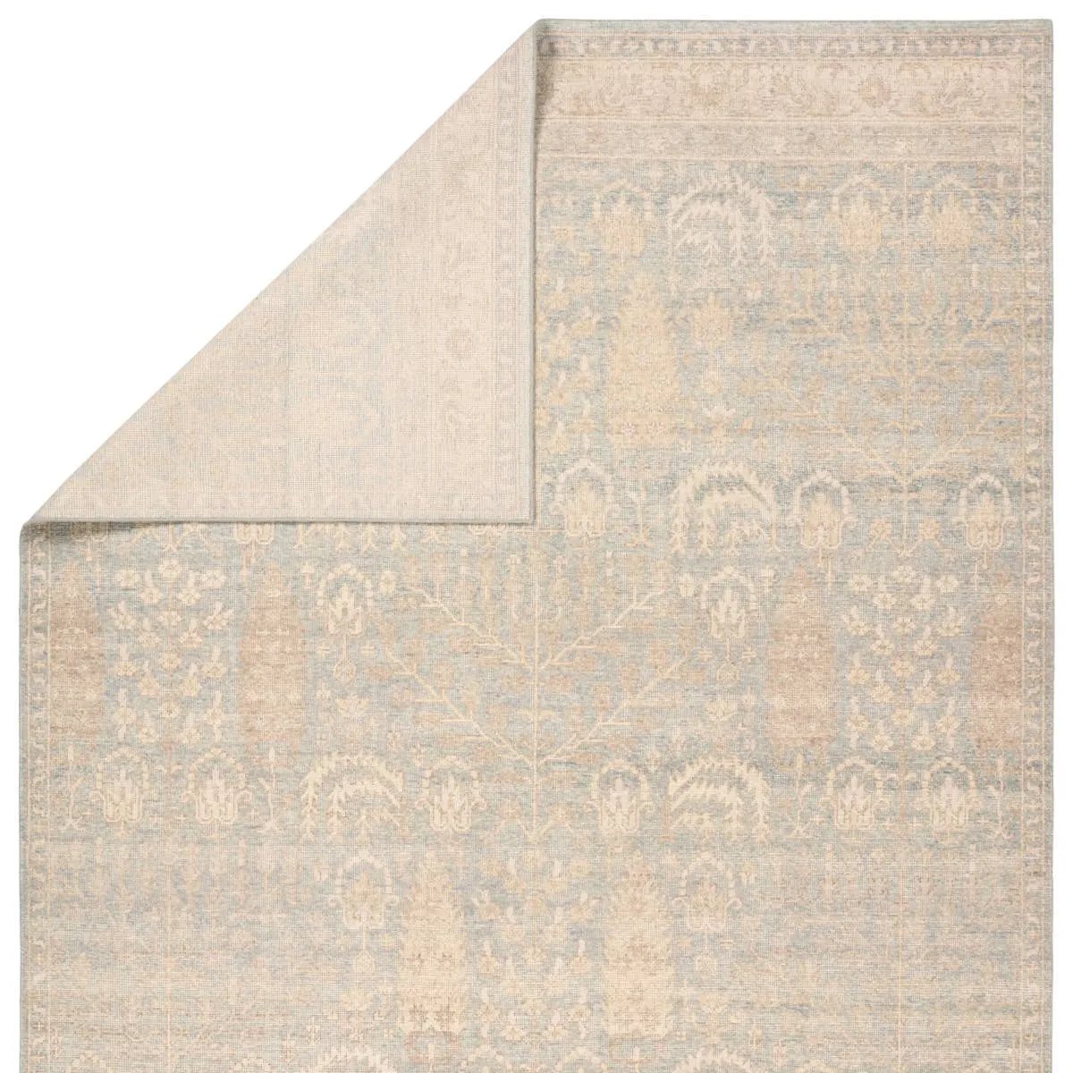Featuring Onessa Delwyn Hand-Knotted Rug by Jaipur Living at Amethyst Home. The Onessa Delwyn marries traditional motifs with soft, subdued colorways for the perfect blend of fresh and time-honored style. These hand-knotted wool rugs feature hand-sheared quality with a coveted vintage look. The Delwyn rug features distressed Tree of Life patterns granting a. Amethyst Home provides interior design, new home construction design consulting, vintage area rugs, and lighting in the Charlotte metro area.