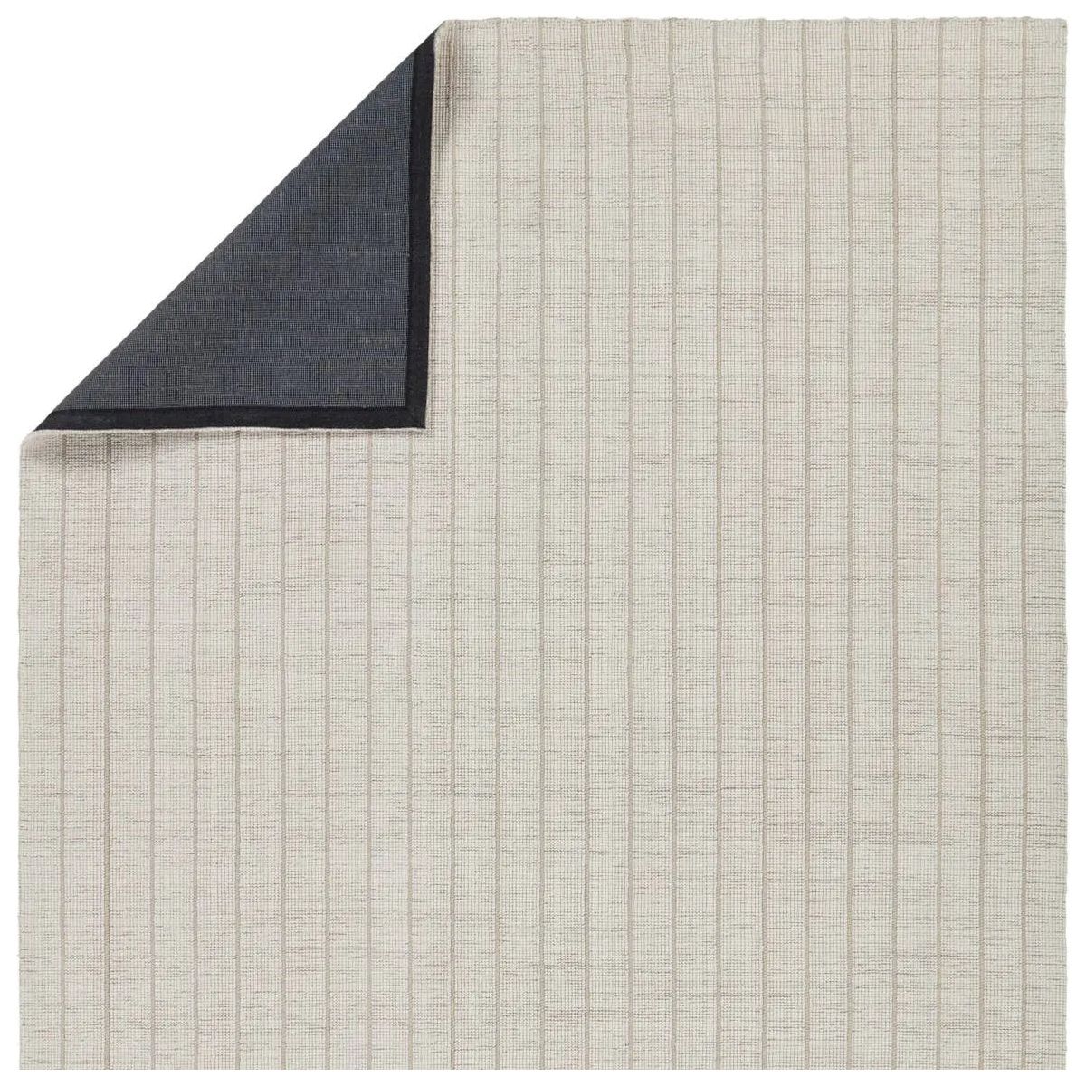 Featuring Oxford  Highgate Rug by Jaipur Living at Amethyst Home. Elegant and casual in the same moment, the Oxford Highgate by Barclay Butera introduces handwoven accents to an array of spaces. The natural, undyed yarns complement a range of palettes and styles, perfectly paired for modern and traditional homes alike. The Highgate design features a stripe patt. Amethyst Home provides interior design, new home construction design consulting, vintage area rugs, and lighting in the Omaha metro area.