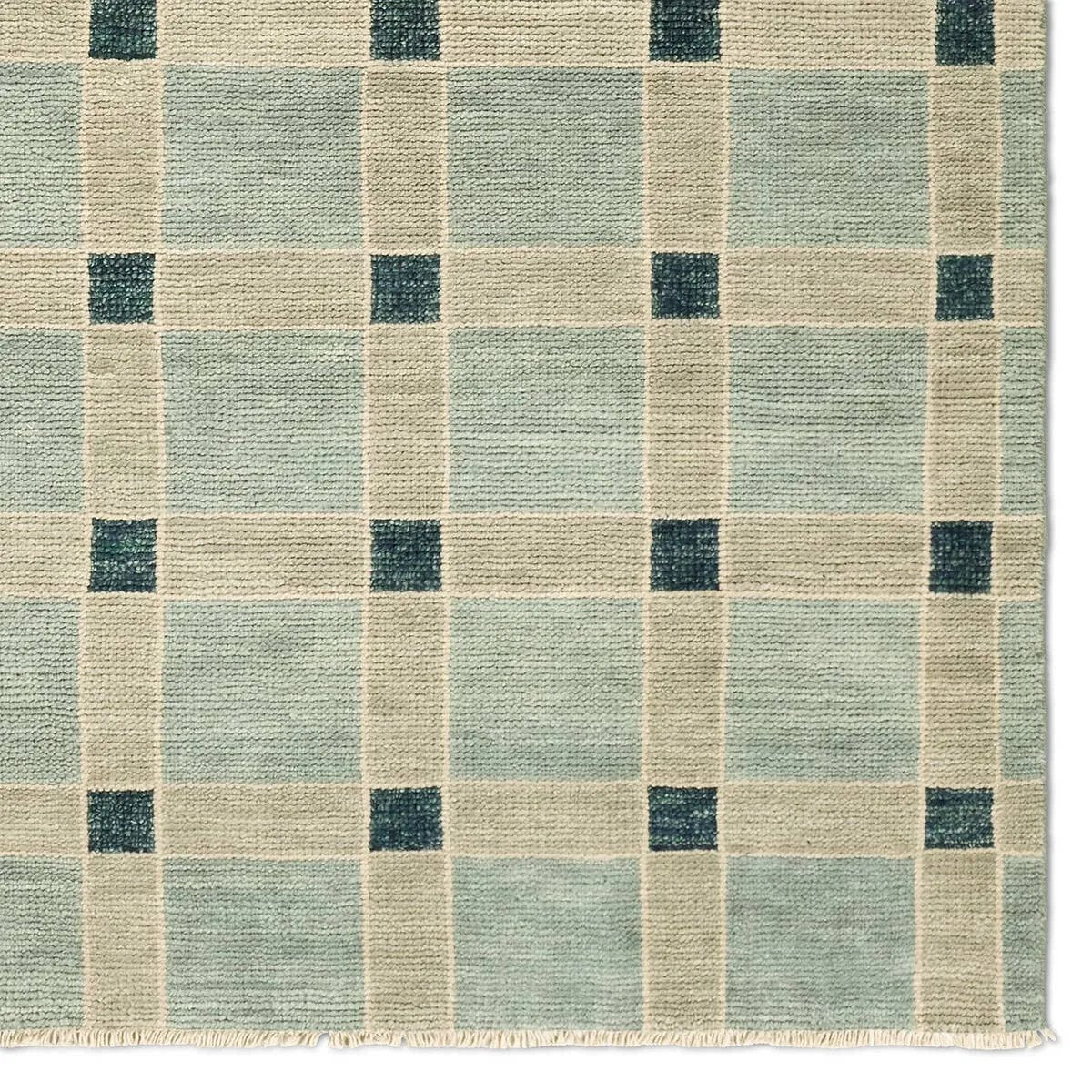 Featuring Quinlan Hand-Knotted Rug by Jaipur Living at Amethyst Home. The Quinlan design reinvents timeless geometric patterns, fusing classic charm with a modern edge. Soft beige tones, punctuated by a blue accent, elevate any mid-century modern space. Handcrafted from naturally stain-resistant wool, this rug handles medium-traffic areas, kids, and pets . Amethyst Home provides interior design, new home construction design consulting, vintage area rugs, and lighting in the Los Angeles metro area.