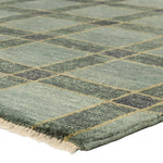 Featuring Quinlan Hand-Knotted Rug by Jaipur Living at Amethyst Home. The Quinlan design reinvents timeless geometric grid patterns, fusing classic charm with a modern edge. Its beautiful blue hue elevates any mid-century modern space, while the 100% wool construction offers natural stain resistance. Stylish and durable, this piece is designed to stand the. Amethyst Home provides interior design, new home construction design consulting, vintage area rugs, and lighting in the Washington metro area.