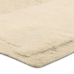 Featuring Riya Hand-Knotted Rug by Jaipur Living at Amethyst Home. The Lasden Riya redefines contemporary style with large-scale geometric patterns hand-knotted on plush wool. The Riya design offers an inviting softness underfoot, while pleasing the eyes with its neutral tones and visual interest. A textured high-low effect brings the Brutalist pattern to l. Amethyst Home provides interior design, new home construction design consulting, vintage area rugs, and lighting in the San Diego metro area.