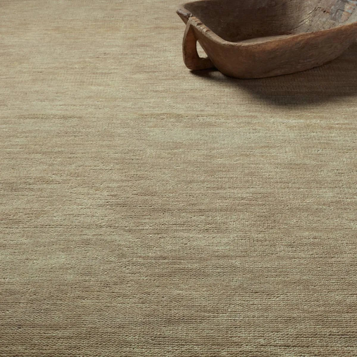 Featuring Saga Origin Hand-Knotted Rug by Jaipur Living at Amethyst Home. The sophisticated Saga Origin lends balance and a relaxed, grounding vibe to modern interiors. The Origin area rug anchors a space with a solid, subtly striated design in a dark taupe colorway. Hand knotted by skilled artisans, this durable wool accent marries simplicity and luxury with . Amethyst Home provides interior design, new home construction design consulting, vintage area rugs, and lighting in the Austin metro area.